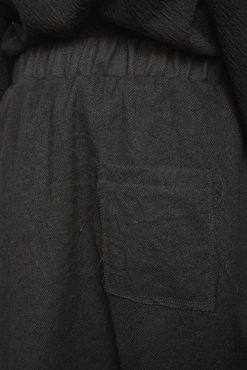 eigensinnig wien | Russell | Schwarze Designer Woll-Cropped Drop Crotch Pants