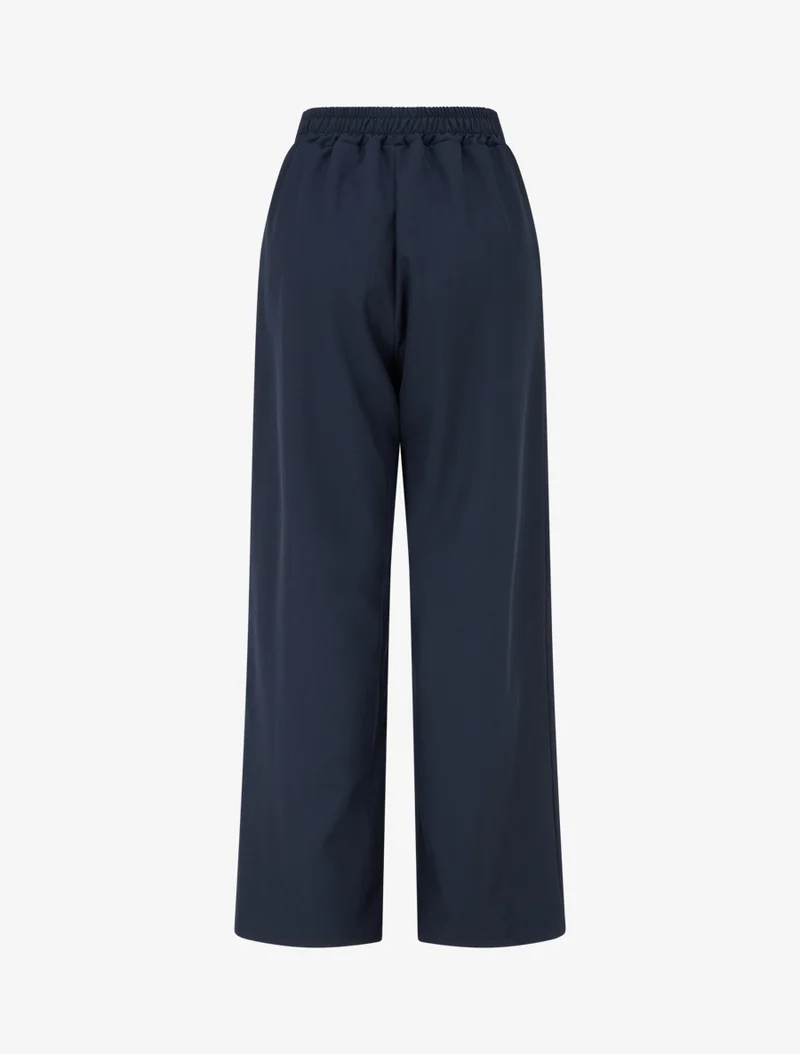 Weit geschnittene Hose mit hoher Taille und Schmuckverzierung. - Marine