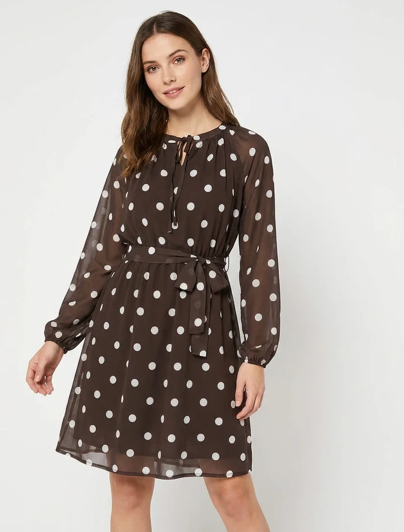 Ausgestelltes gepunktetes Kleid mit langen Ärmeln - Braun