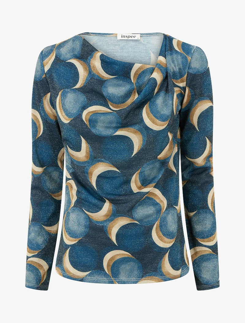 Irisierendes Oberteil mit fantasievollen runden Aufdrucken, rechts oben. - Entenblau
