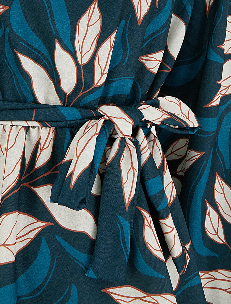 Elastische Bluse mit Blattdruck - Entenblau