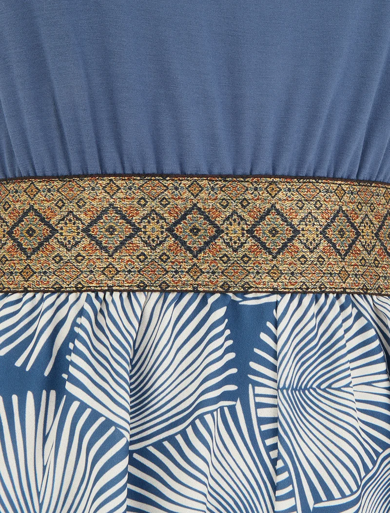 Bedruckter Blätter-Jumpsuit mit fantasievollen Trägern - Blau
