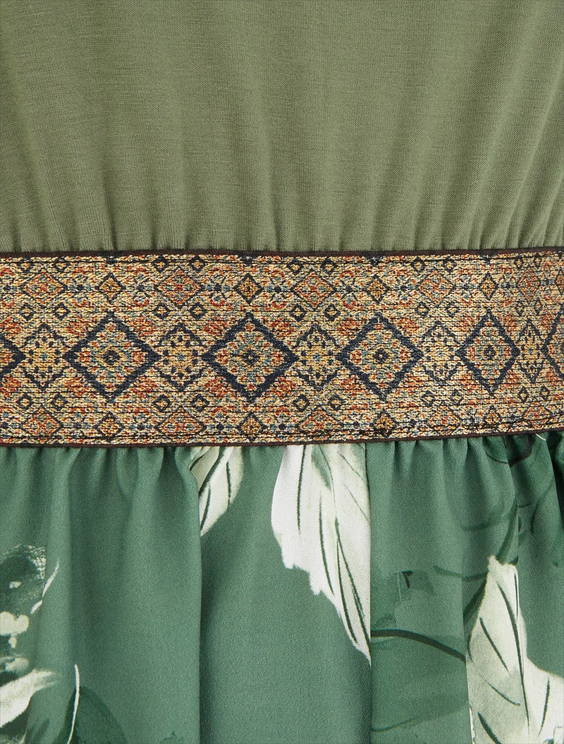 Bedruckter Blumen-Jumpsuit mit fantasievollen Trägern - Kaki