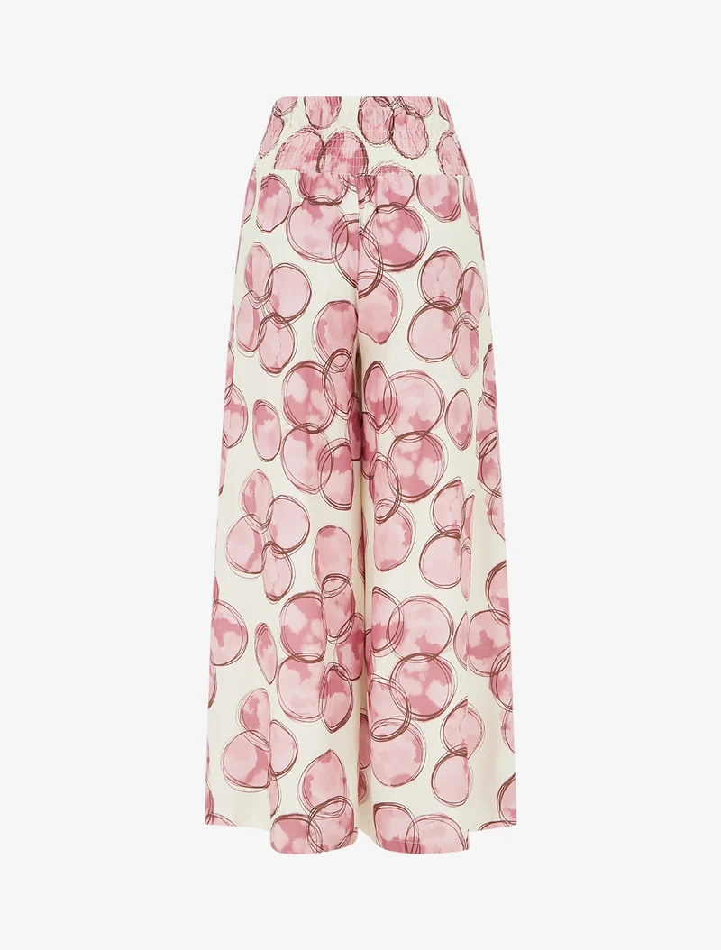 Elastische Hose mit Kreisaufdruck - Rose