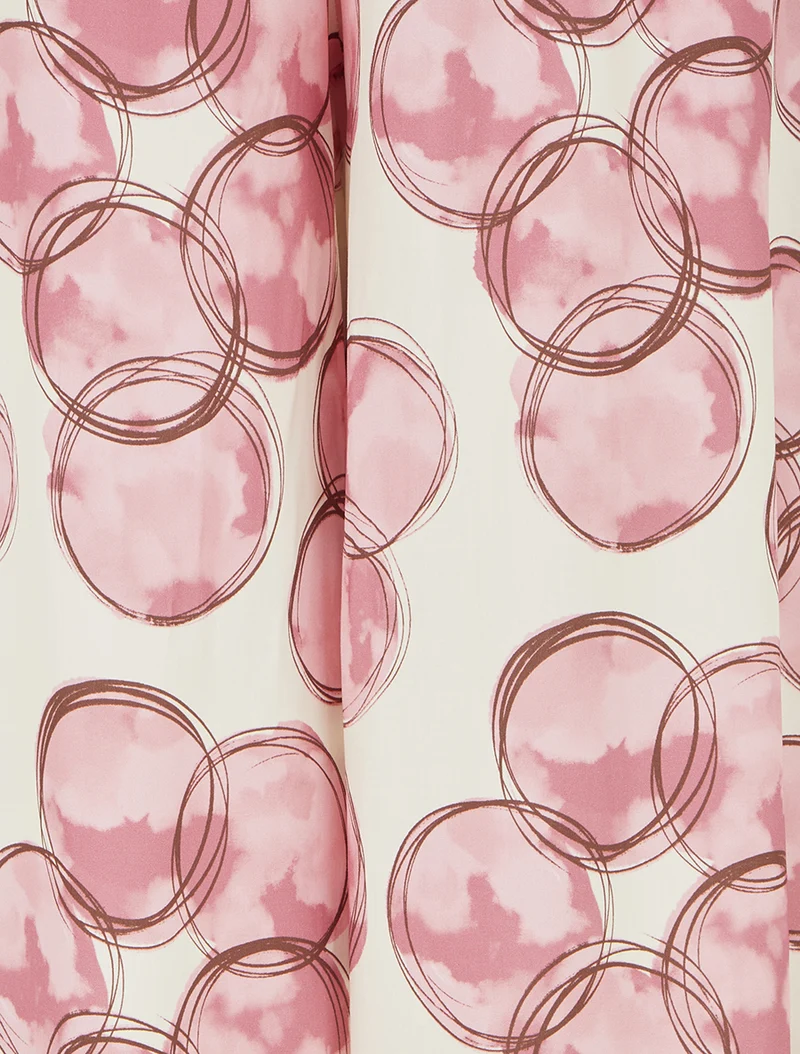 Elastische Hose mit Kreisaufdruck - Rose