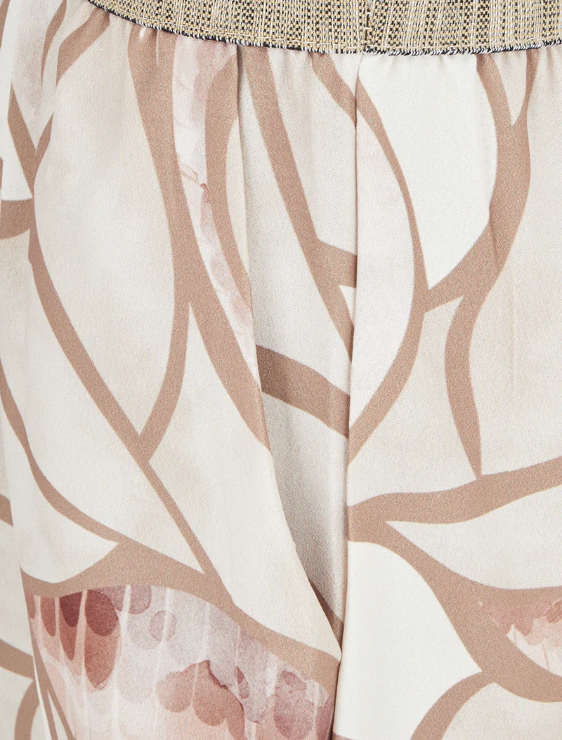 Spitzen- und grafisch bedruckter Jumpsuit - Beige