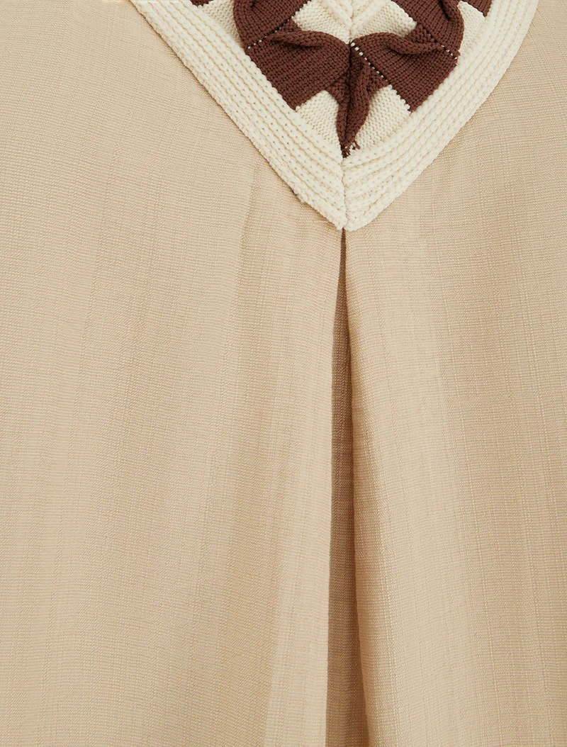 Ärmelloses Top mit stilisiertem V-Ausschnitt - Beige
