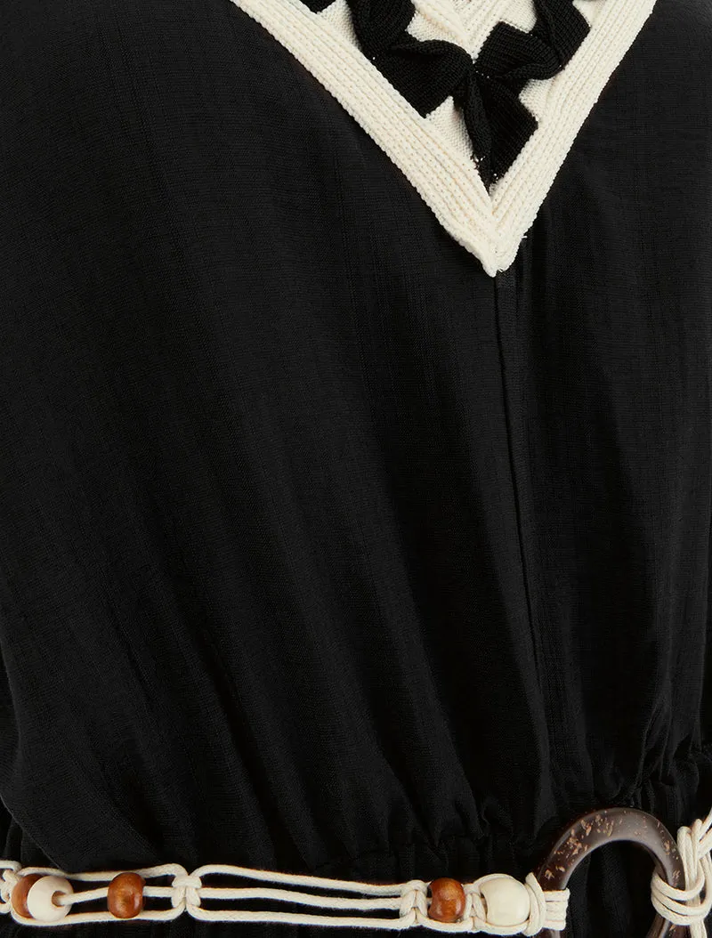 Ärmelloser Jumpsuit mit schmalen Trägern und fantasievollem Kragen - Schwarz