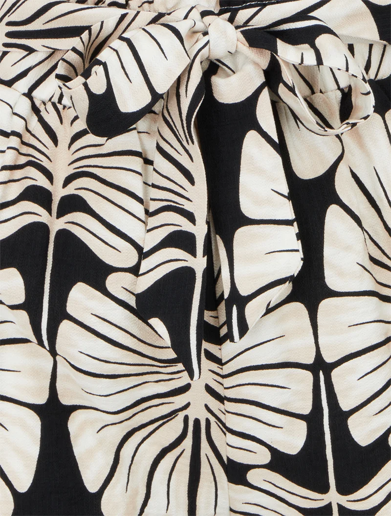 Elastische Shorts mit tropischem Druck - Schwarz