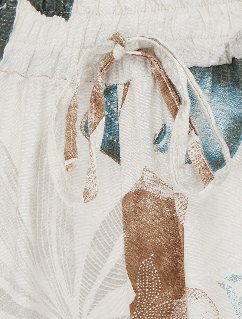 Elastische Hose mit Blattmuster - Beige