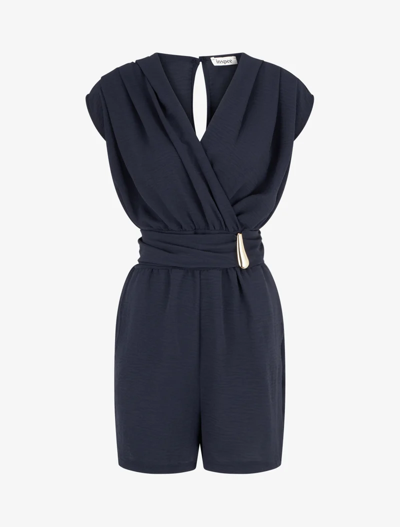 Einfarbiger Jumpsuit mit Schmuckeinsatz an der Taille. - Marine