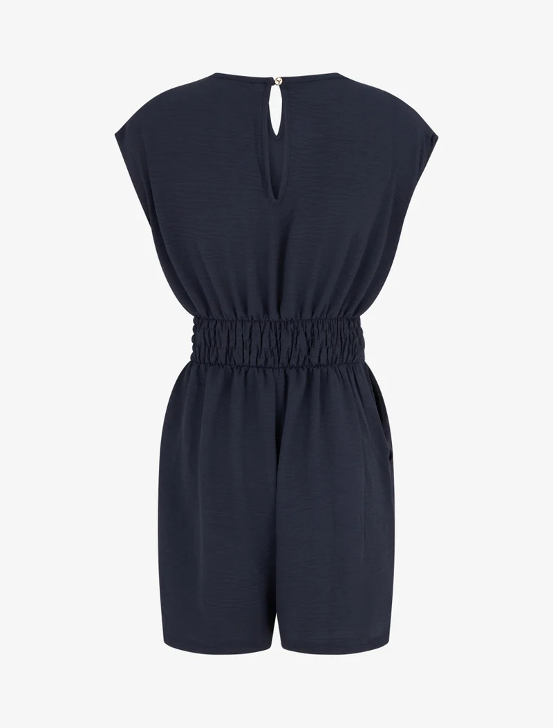 Einfarbiger Jumpsuit mit Schmuckeinsatz an der Taille. - Marine
