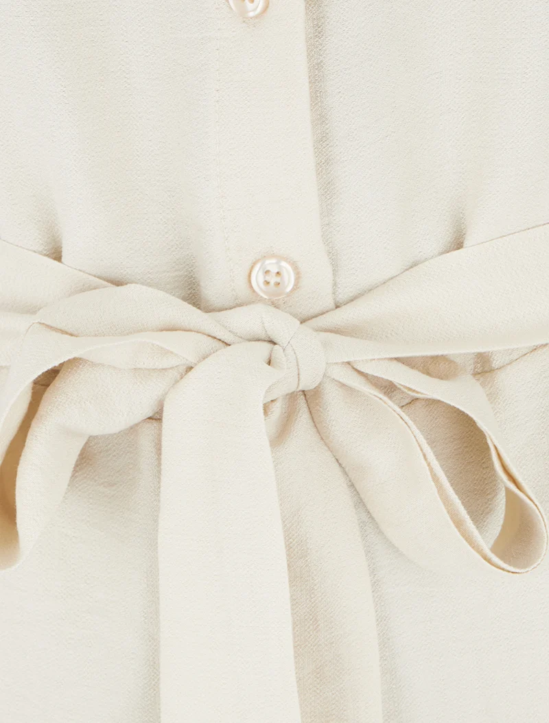 Ärmelloser, geknöpfter Jumpsuit - Beige