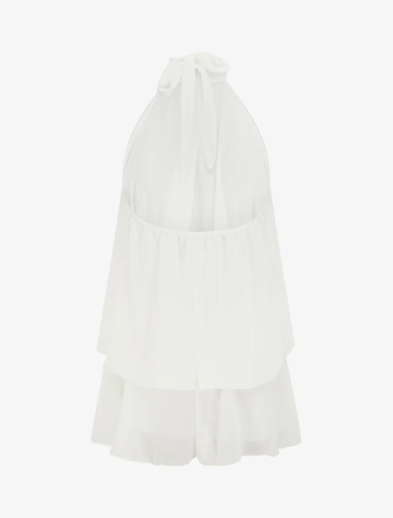 Rückenfreier Jumpsuit mit Rüschen und Trompe-l'œil-Effekt. - Weiß