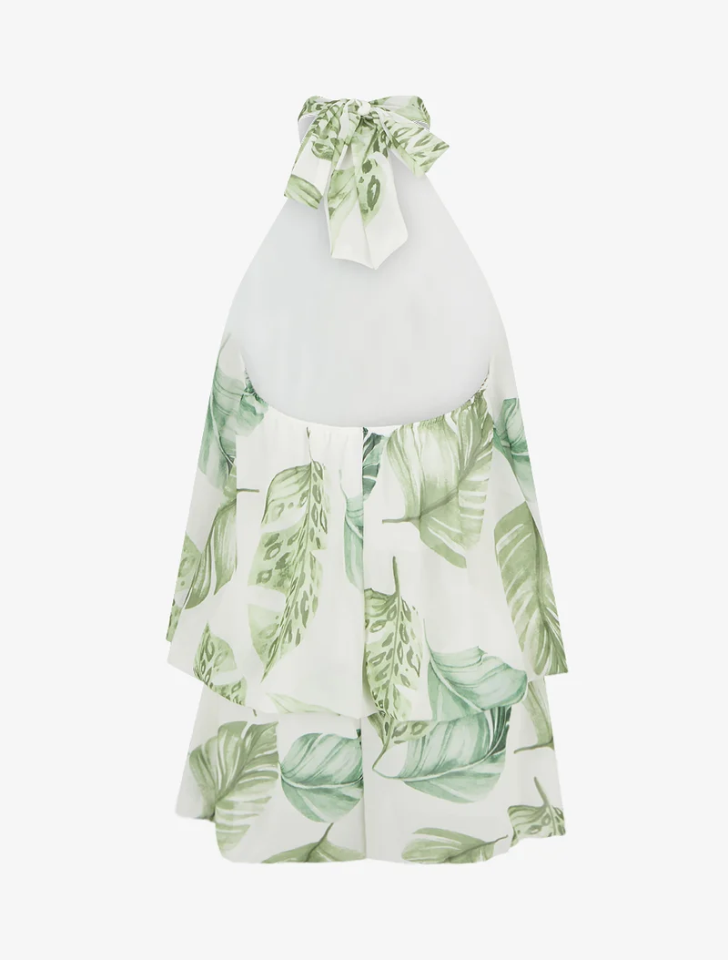 Rückenfreier Jumpsuit mit Rüschen und Blätterdruck. - Grün