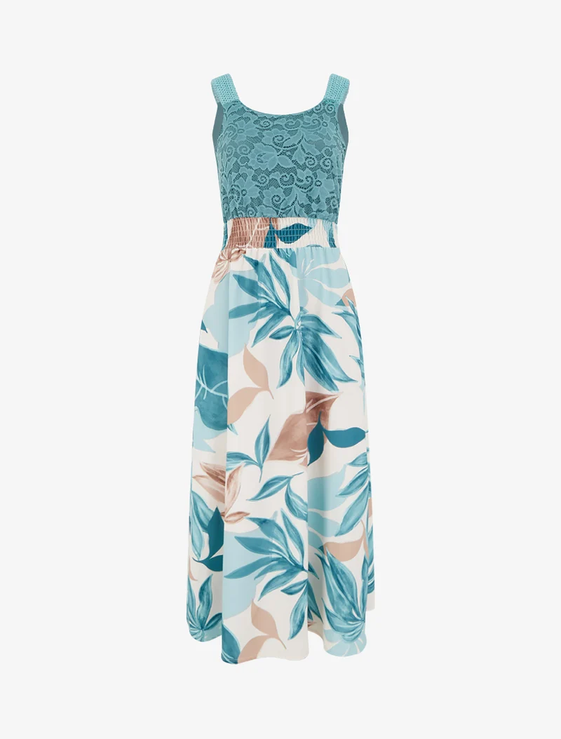 Kleid mit Fantasiemuster und Trägern aus Häkelarbeit. - Türkis