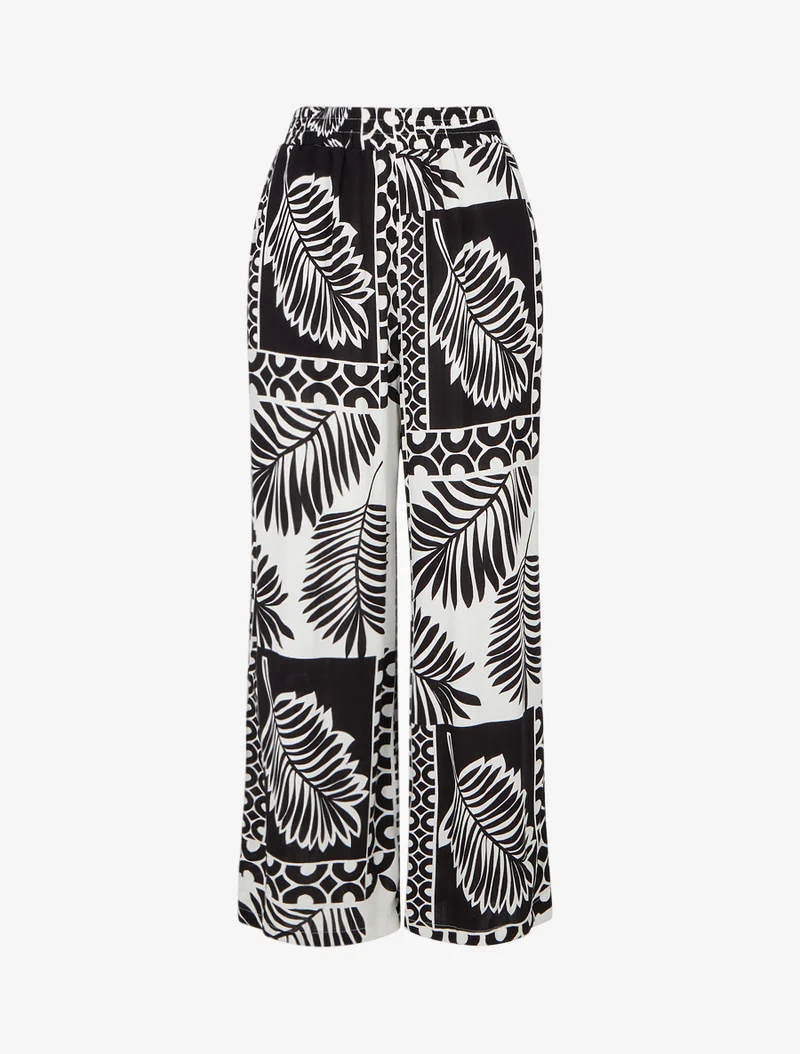 Weit geschnittene Hose mit Palmenblatt-Print - Schwarz