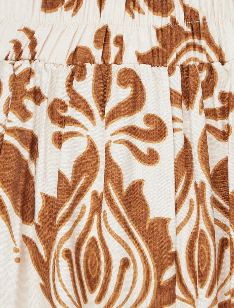 Weit geschnittene Hose mit hoher Taille und arabeskenmuster. - Braun