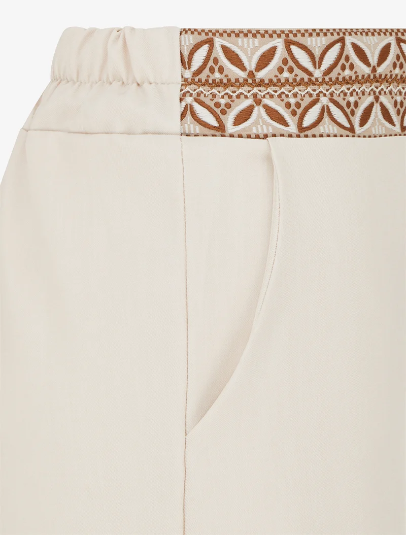 Fließende einfarbige Hose mit hoher Taille - Beige