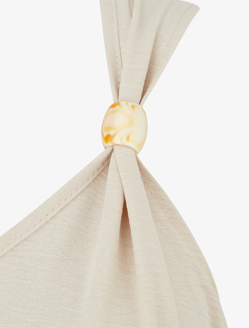 Einfarbiges Kleid mit Holzkugelbesatz - Beige