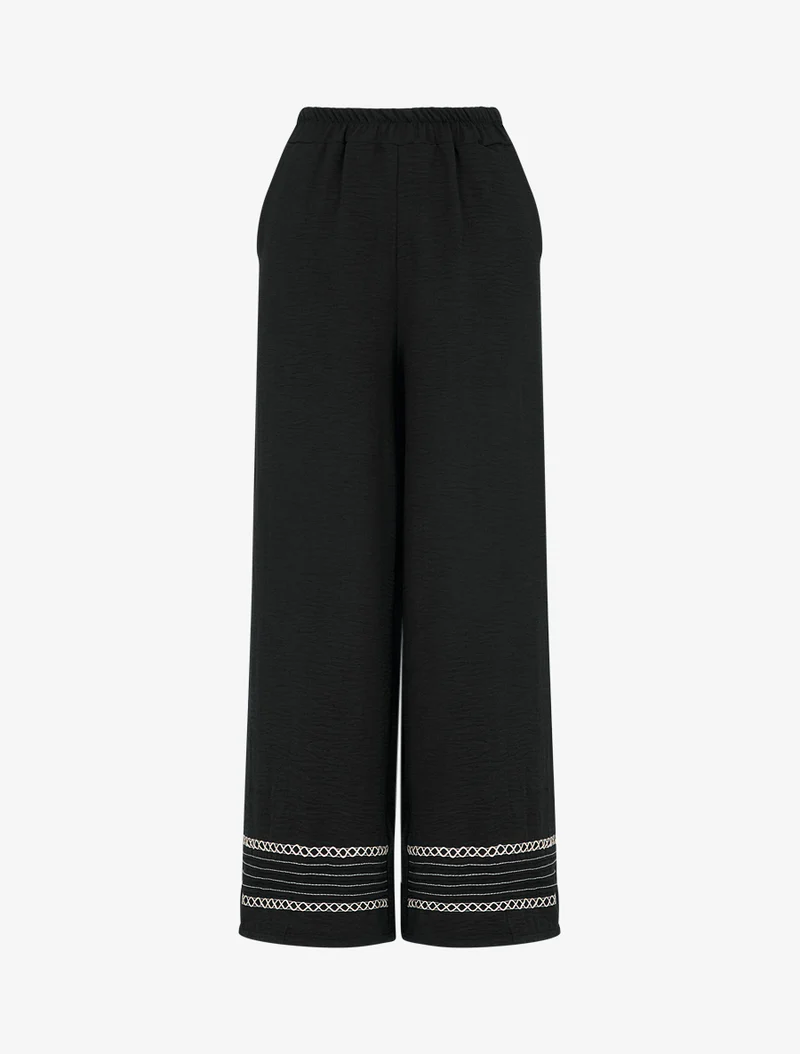 Weite Hose mit bestickten Kanten - Schwarz