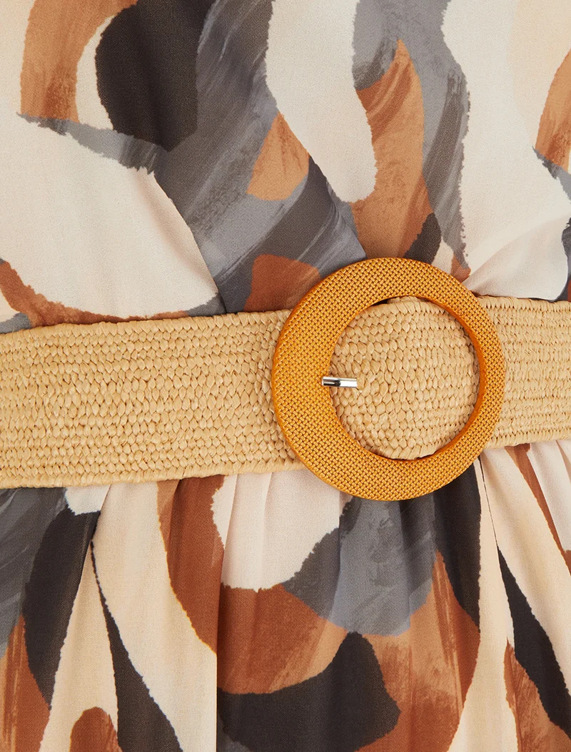 Kleid mit Flügelärmeln und Fantasiemuster. - Schwarz