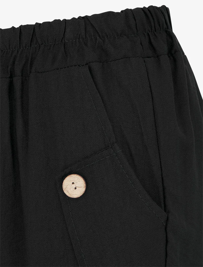 Weite einfarbige Hose mit dekorativen Knöpfen - Schwarz