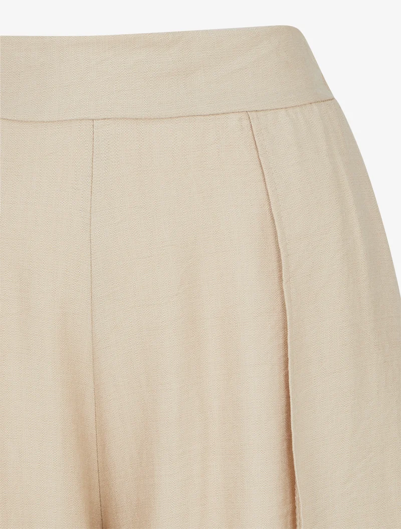 Weite Hose mit asymmetrischen Kanten - Beige