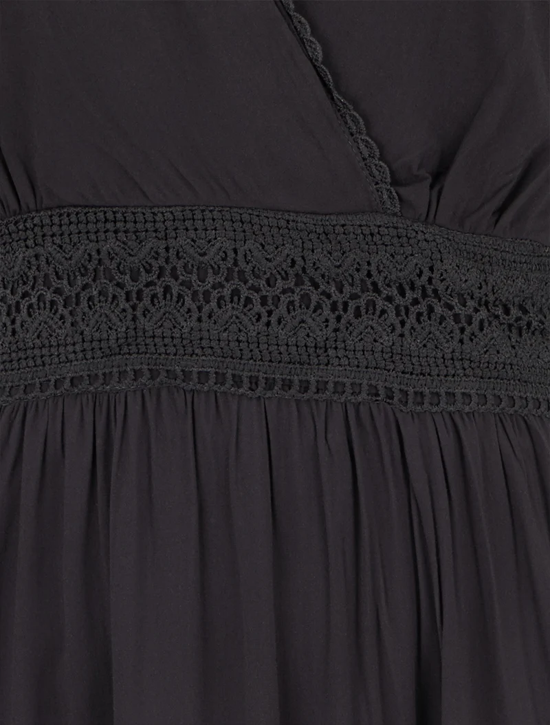 Ärmelloses Kleid mit Stickereien - Schwarz