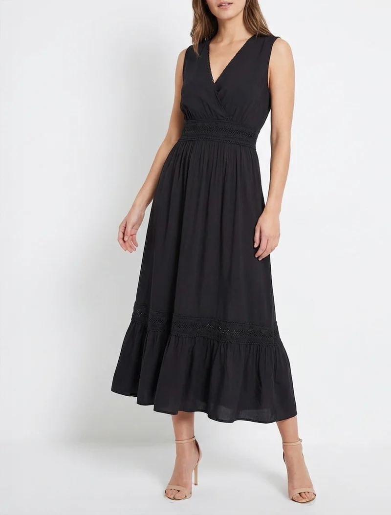 Ärmelloses Kleid mit Stickereien - Schwarz