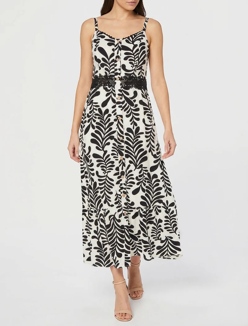 Ausgestelltes Kleid mit Fantasiemuster - Schwarz