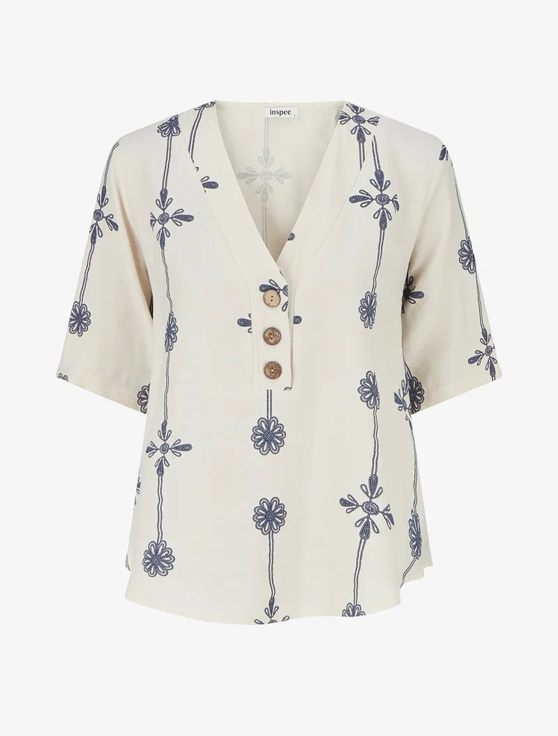 Weit geschnittenes Oberteil mit kurzen Ärmeln und Blumenmuster - Beige