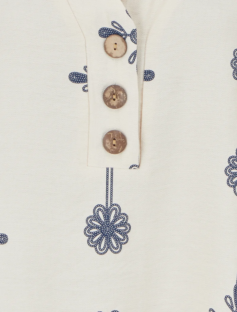 Weit geschnittenes Oberteil mit kurzen Ärmeln und Blumenmuster - Beige