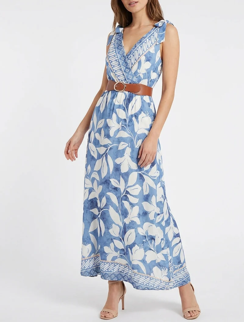 Kleid mit tropischem Blumenprint und Bindeträgern. - Hellblau