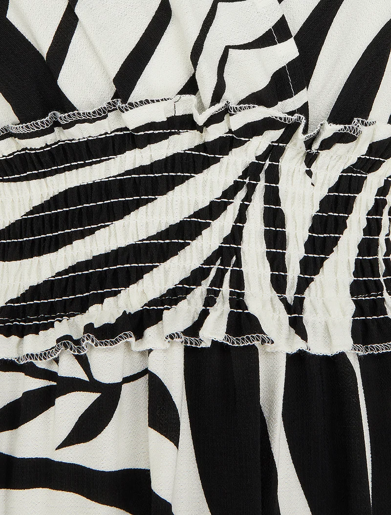 Kleid mit Blätterdruck und Knotenträgern - Schwarz