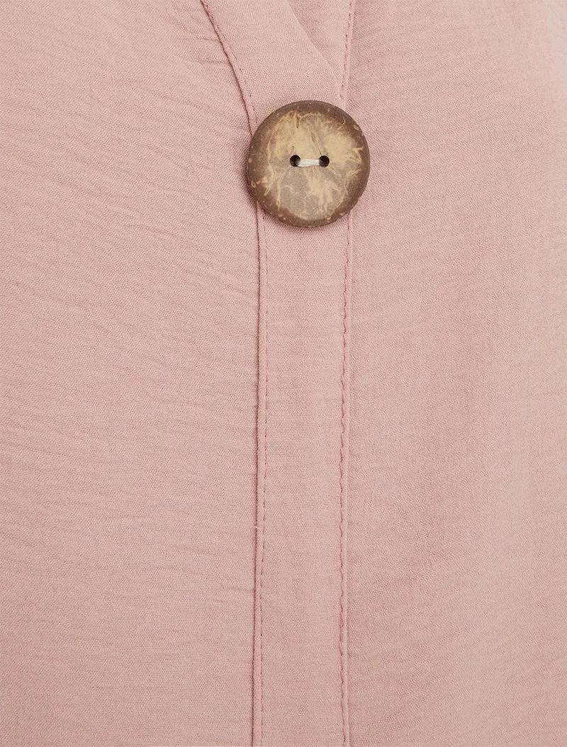 Ärmelloses Oberteil mit Knöpfen rechts oben. - Rose