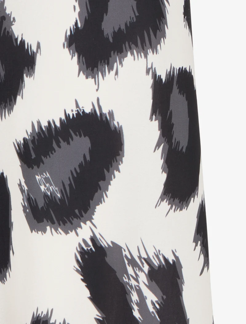 Weit geschnittene Hose mit fantasievollem Leopardenmuster - Schwarz