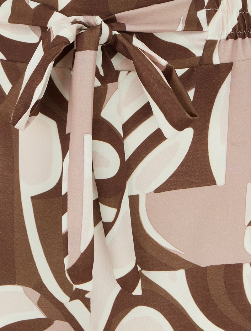 Weit geschnittene Hose mit grafischem Print. - Braun