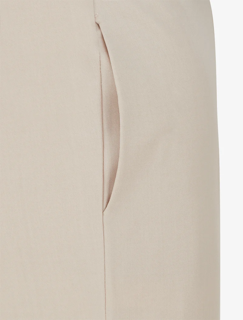 Gerade geschnittene, einfarbige, elastische Hose - Beige