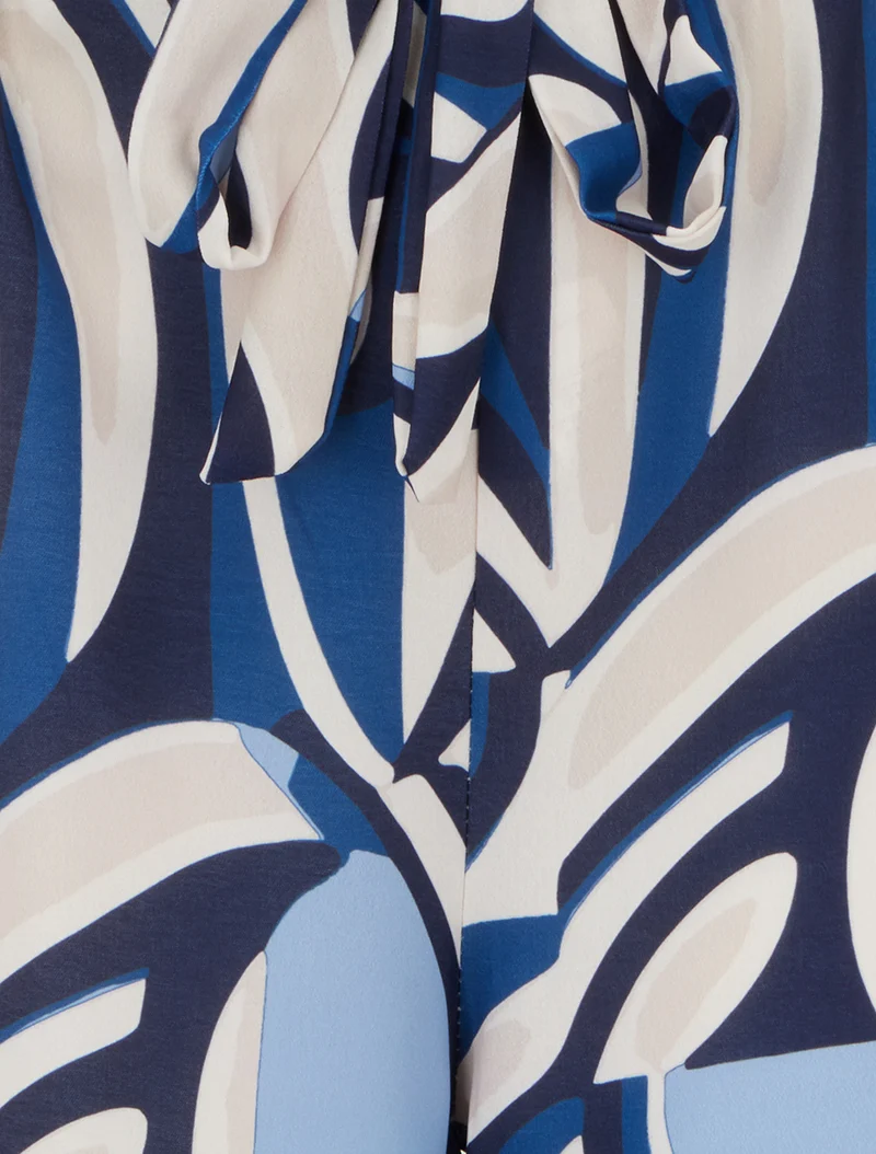 Weit geschnittene Hose mit grafischem Print. - Blau