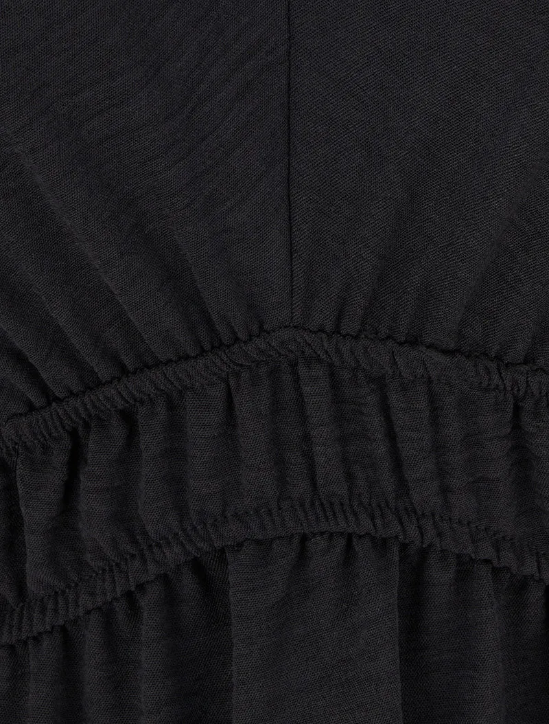 Langes ausgestelltes Kleid mit Perlenriemen - Schwarz