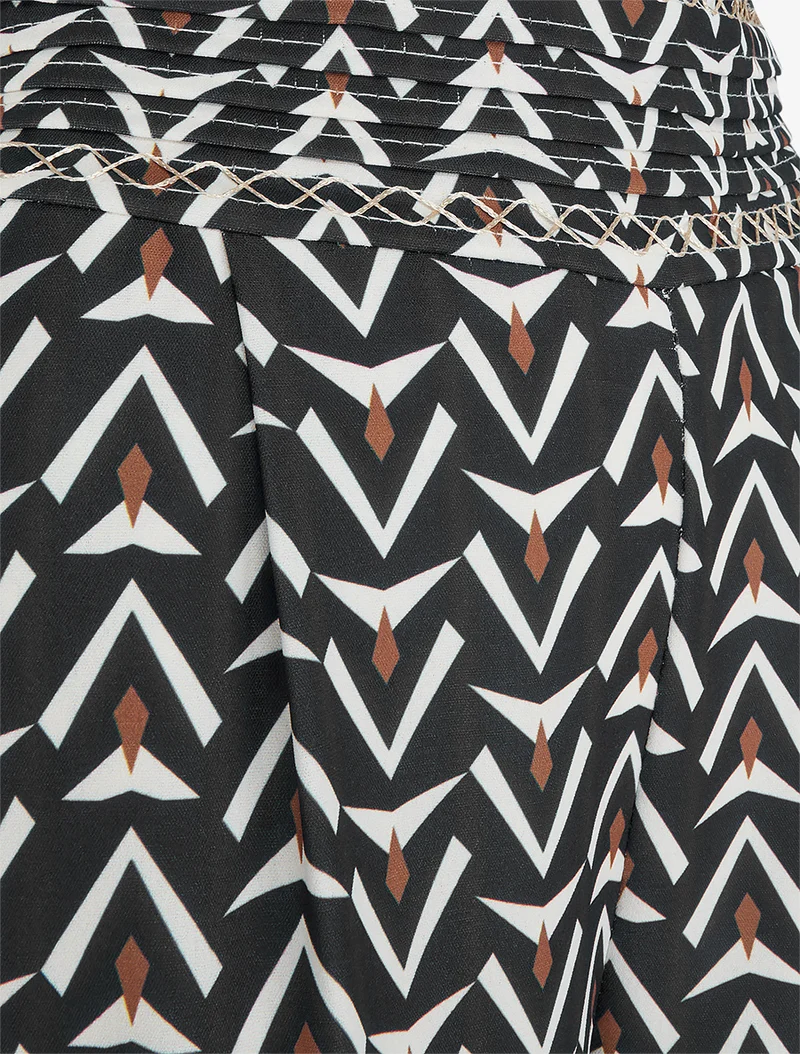 Weit geschnittene Hose mit geometrischem Muster - Schwarz