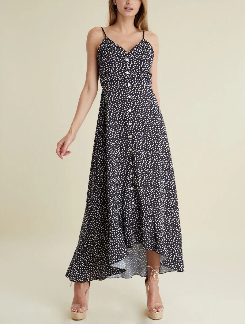 Asymmetrisches Schößchenkleid mit Punktmuster - schwarz