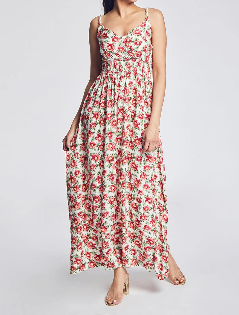Langes Empire-Kleid mit tropischem Blumenmuster und Trägern mit Perlen. - Weiß