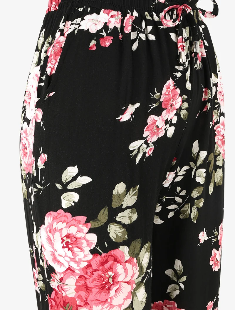 Fließende Hose mit Blumenmuster und elastischen Abschlüssen - Schwarz