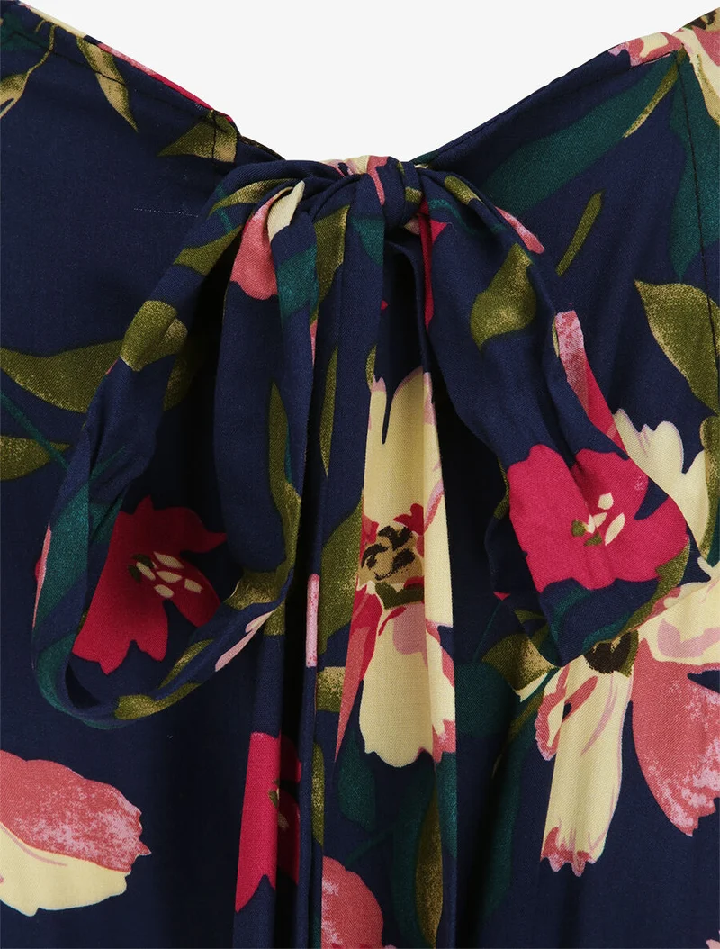 Langes Kleid mit riesigen Gänseblümchen bedruckt - Marine/Rosa