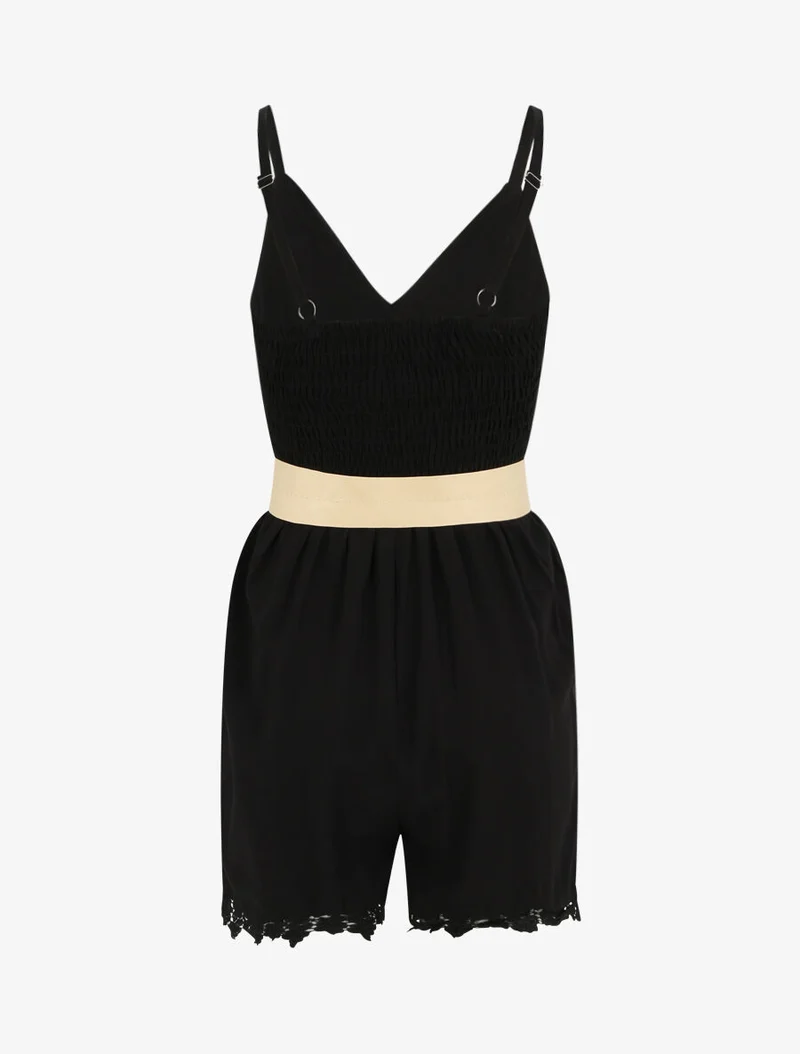 Knopfstilierter Jumpsuit - Schwarz