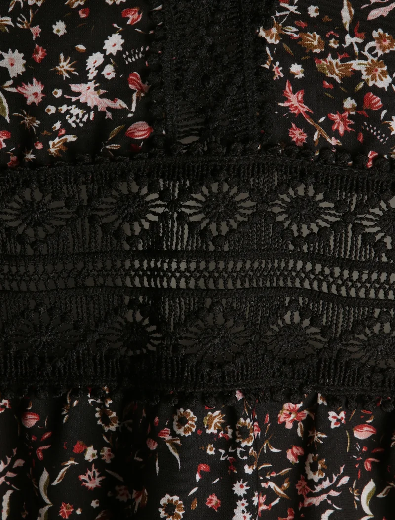 Langes Kleid mit kleinen Blumen bedruckt und V-Ausschnitt aus Spitze. - Schwarz