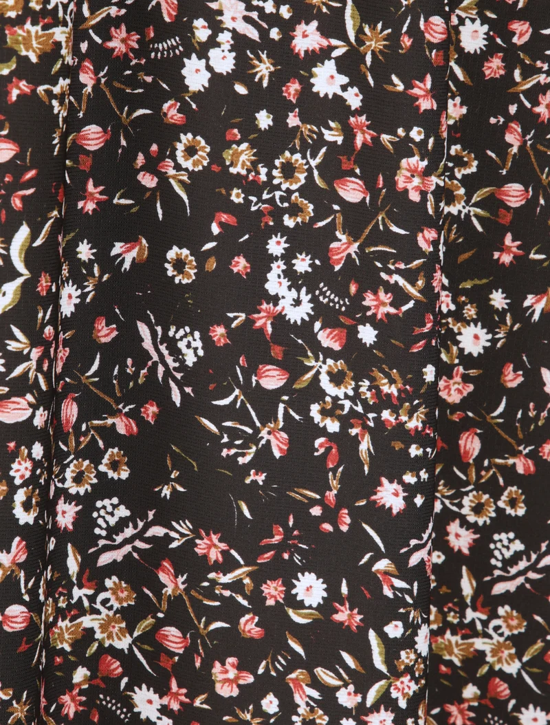 Langes Kleid mit kleinen Blumen bedruckt und V-Ausschnitt aus Spitze. - Schwarz