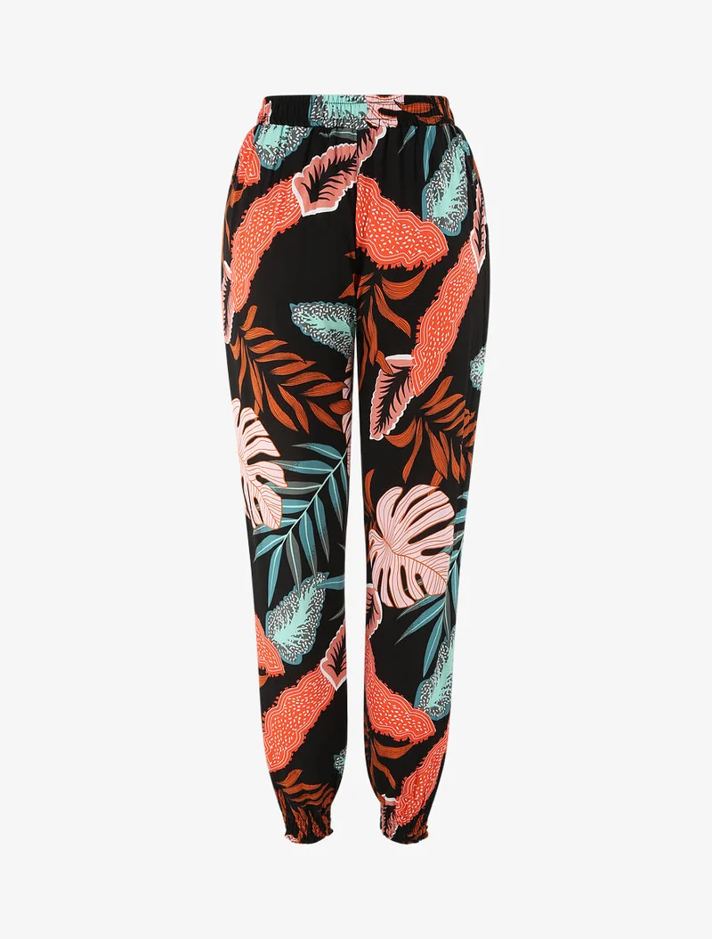 Fließende Hose mit Blätterdruck und elastischen Bündchen - Schwarz